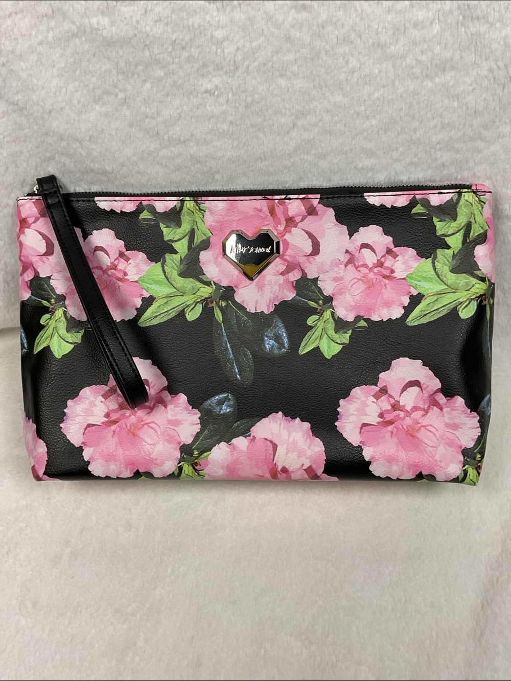 Betsey Johnson Pink Floral Wristlet with Black Background